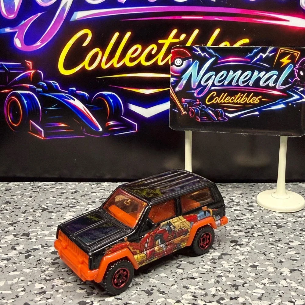 Matchbox Jeep Cherokee MB163 Black Orange Comic Graphics Diecast SUV 1:64 Scale